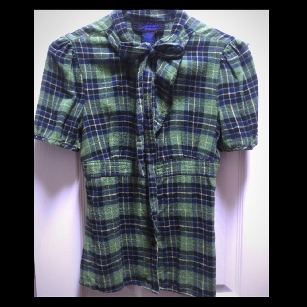 Unique! Button up flannel with cute details!